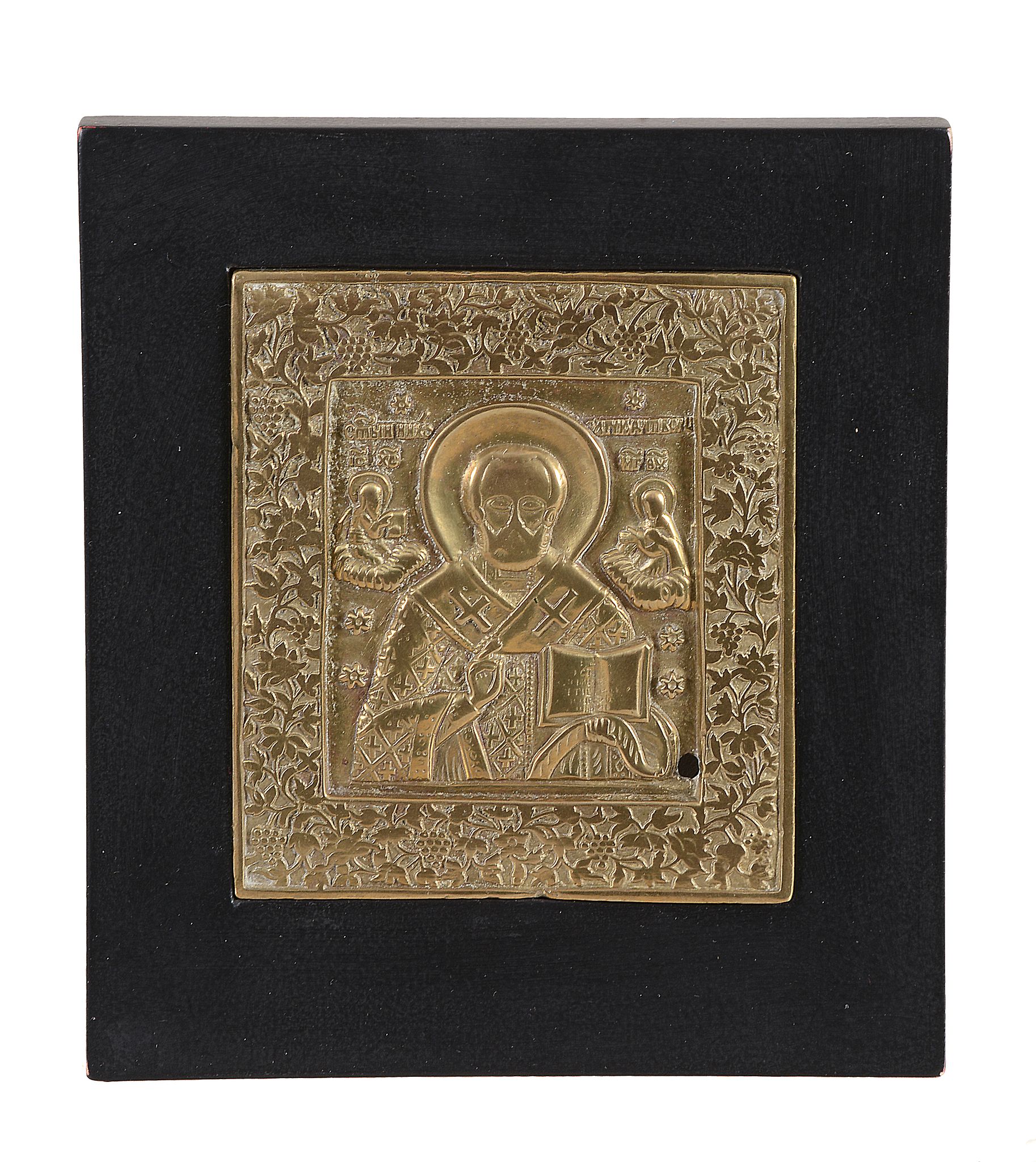 A Russian relief cast brass icon, Saint Nicholas, early 19th century   A Russian relief cast brass