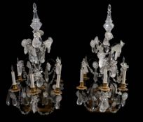 A pair of gilt bronze, moulded glass and rock crystal hung five light...   A pair of gilt bronze,
