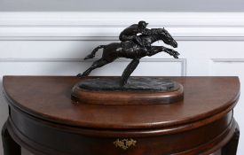 Philip Blacker , a patinated bronze group of a racehorse with jockey up   Philip Blacker (b.