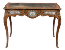 A French walnut and gilt-metal mounted writing table , in Louis XV style   A French walnut and
