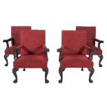 A set of four carved mahogany armchairs in George II style, mid 19th century   A set of four