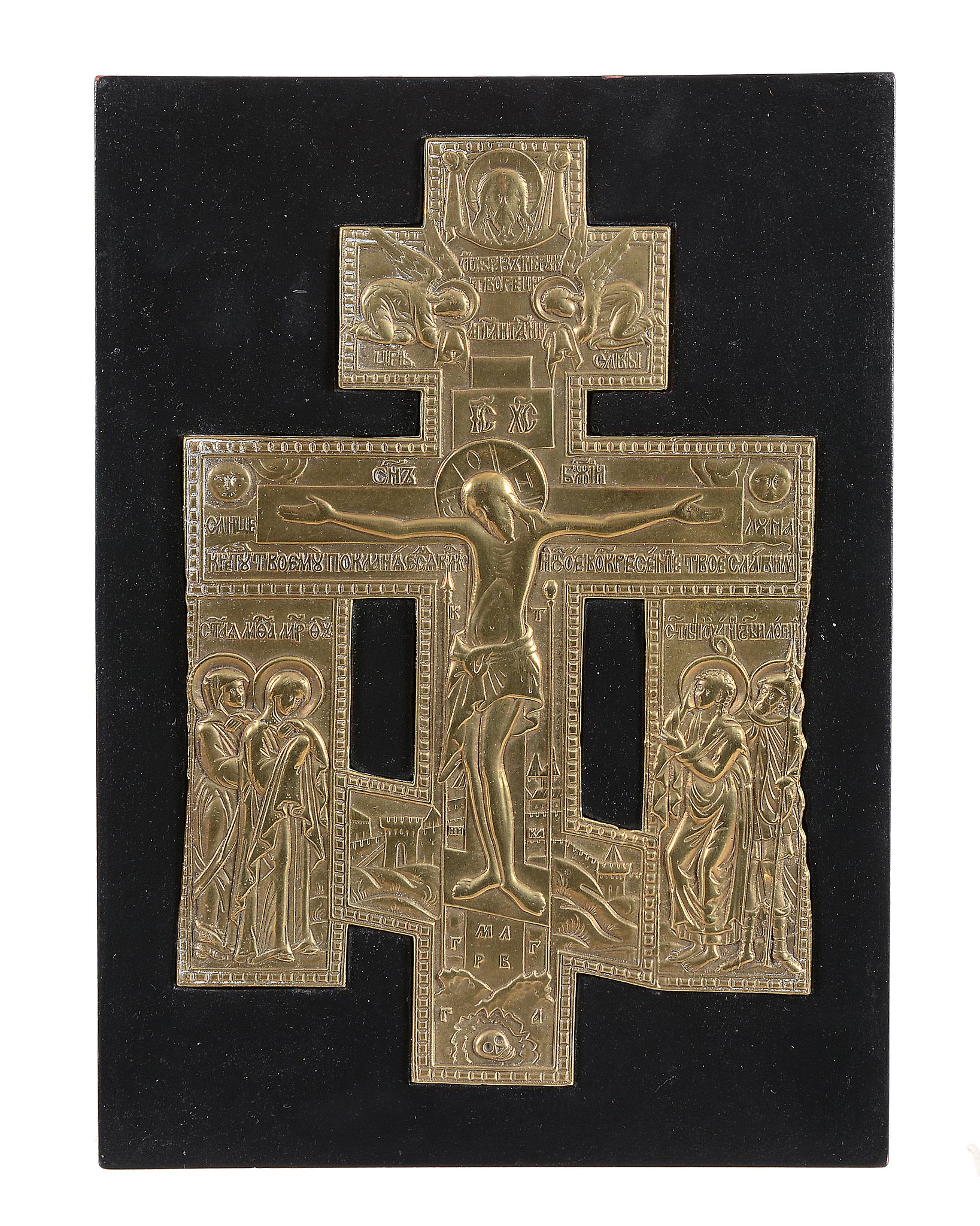 A Russian relief cast brass cross, Christ Crucified, late 18th century   A Russian relief cast brass