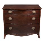 A George III mahogany chest of drawers, circa 1800, probably Channel Islands   A George III mahogany