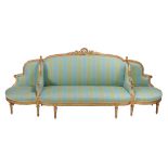 A carved giltwood framed sofa in Louis XVI style, second half 19th century   A carved giltwood