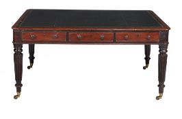 A George IV mahogany library table , 1825   A George IV mahogany library table  , 1825, with three
