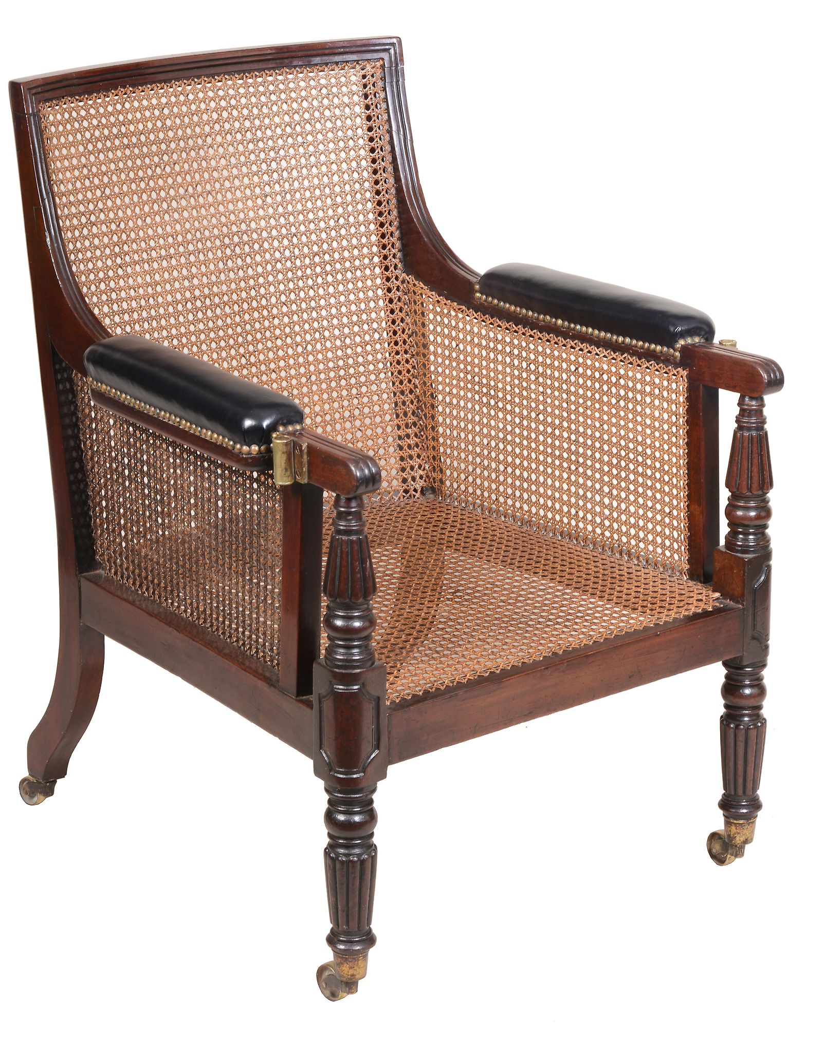 A George IV mahogany library bergere armchair , circa 1825   A George IV mahogany library bergere - Image 2 of 4