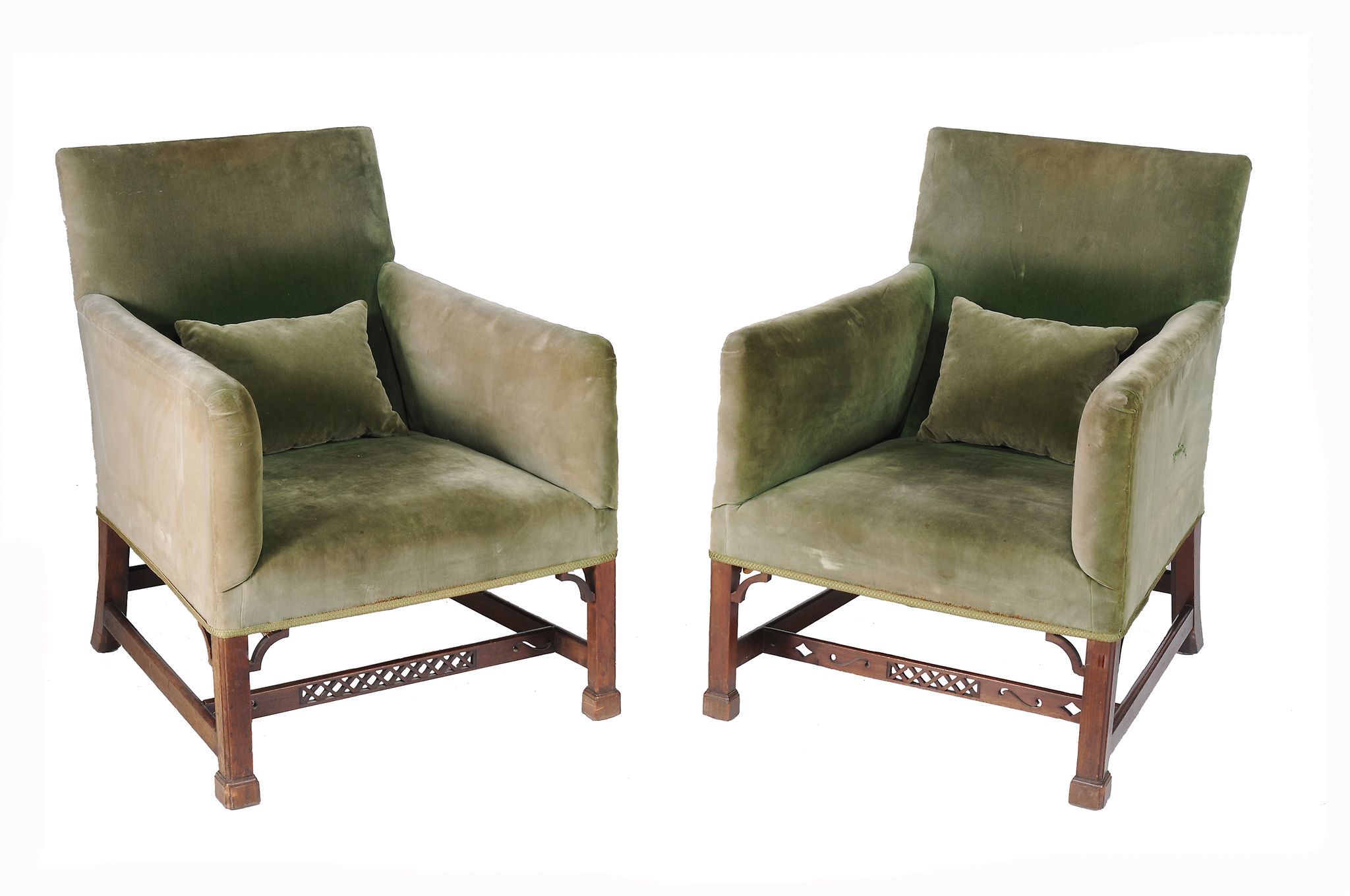 A matched pair of George III mahogany and upholstered armchairs , circa 1770   A matched pair of