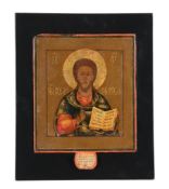A Russian polychrome painted and parcel gilt processional icon   A Russian polychrome painted and