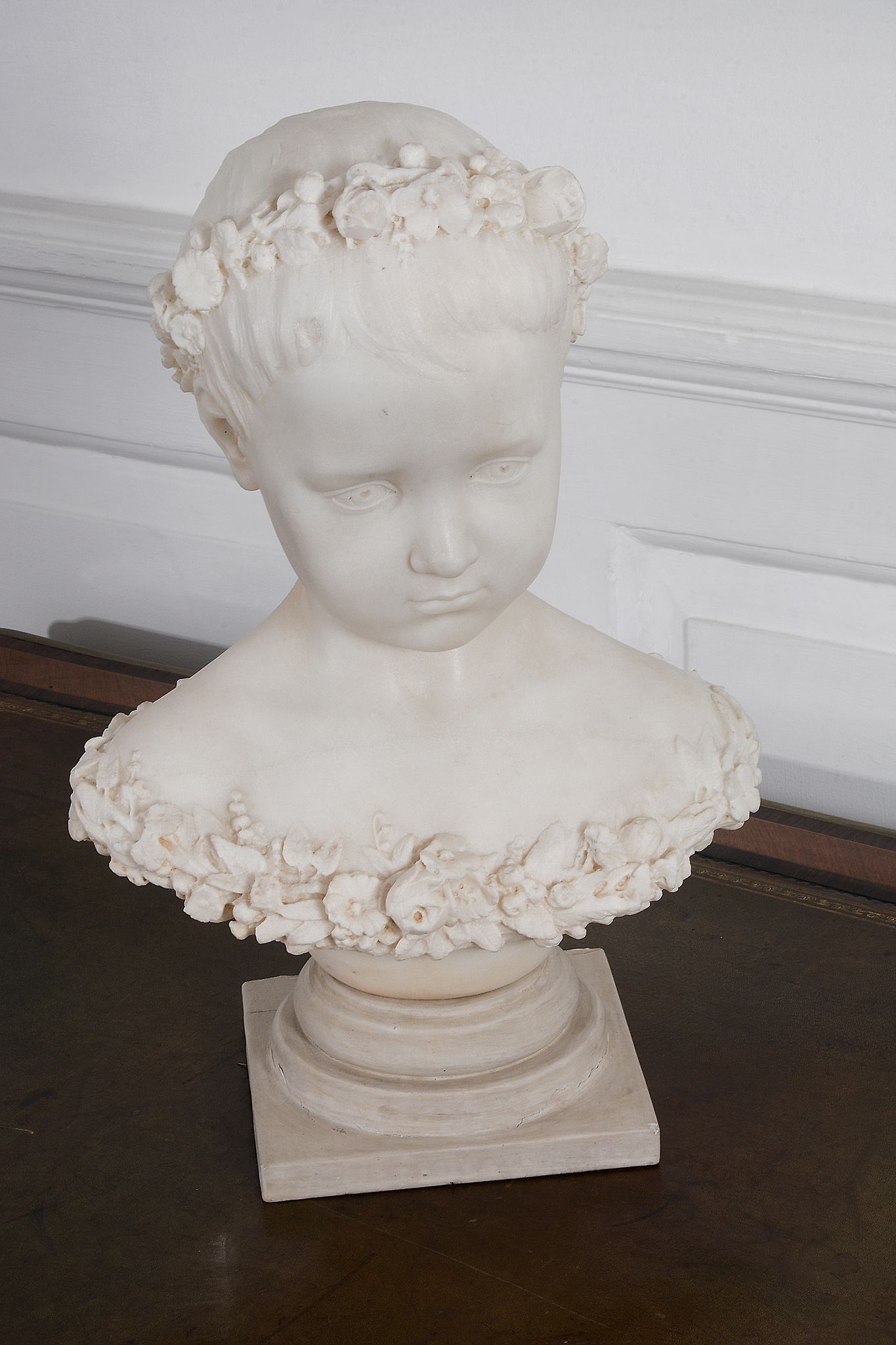 Lorenzo Corelli , a sculpted white marble bust of a young girl   Lorenzo Corelli (Italian, ca.