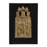 A Russian relief cast brass icon, Saint Nicholas, late 18th century   A Russian relief cast brass