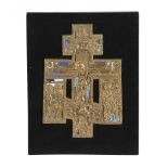 A Russian relief cast and enamelled brass cross, Christ Crucified, circa 1800   A Russian relief