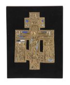 A Russian relief cast and enamelled brass cross, Christ Crucified, circa 1800   A Russian relief