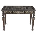 An Italian ebonised, ebony and mother of pearl marquetry inlaid centre table   An Italian