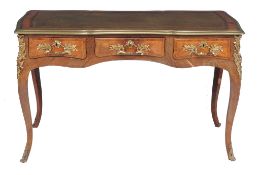 A bois satine, rosewood and gilt metal mounted bureau plat in Louis XV style   A bois satine,