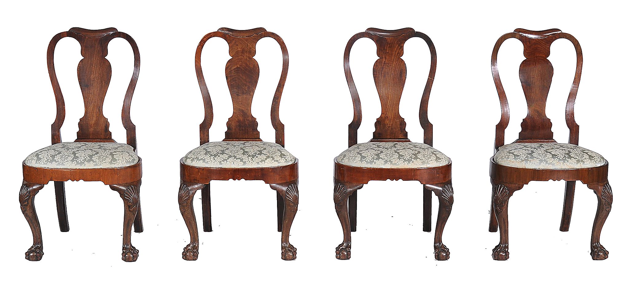 A set of four George II red walnut chairs, circa 1735   A set of four George II red walnut chairs,