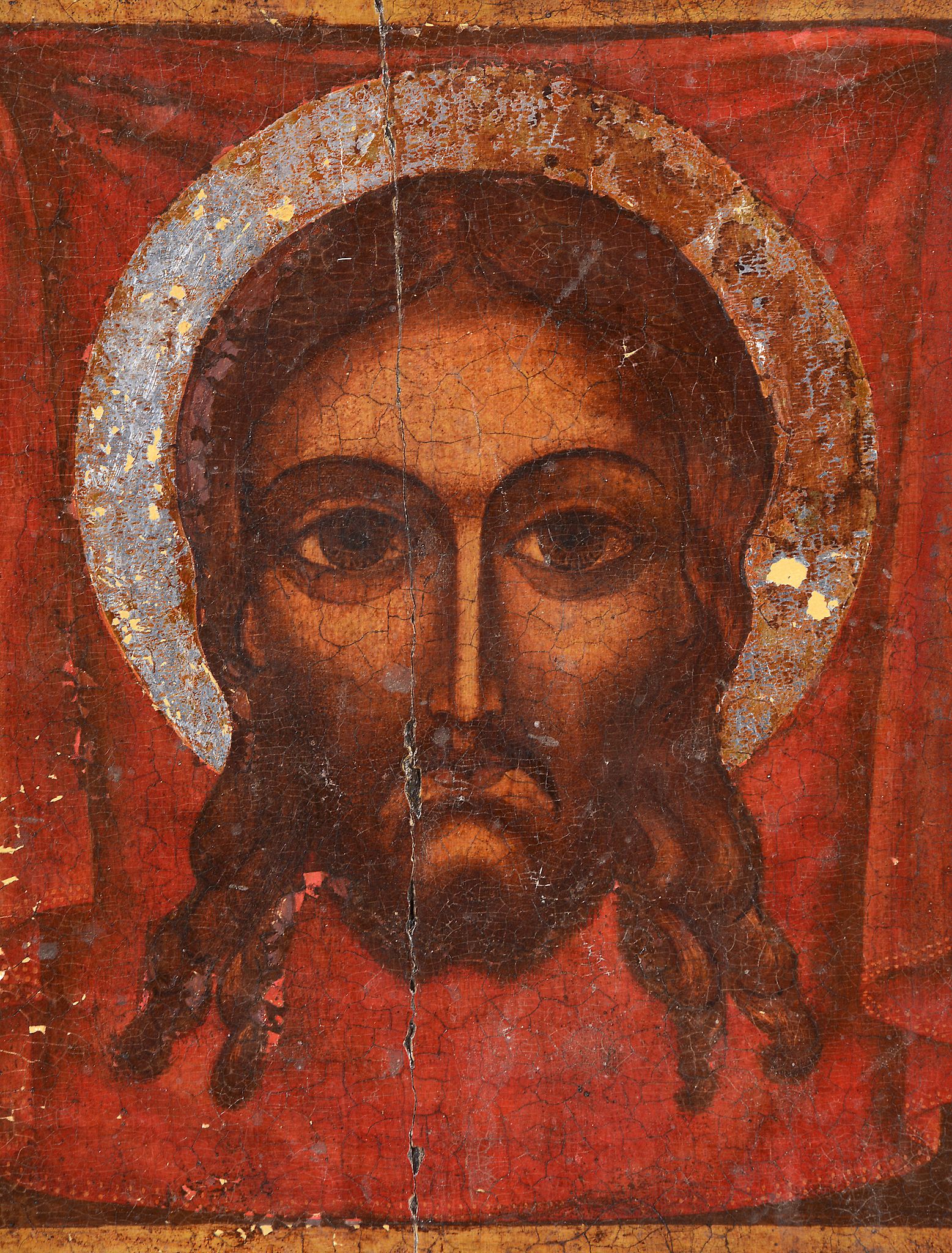 A polychrome painted and parcel silvered icon, the Holy Face, probably Greek   A polychrome - Image 2 of 3