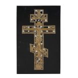 A Russian relief cast and enamelled brass processional cross, Christ Crucified   A Russian relief