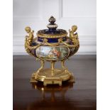 A Sèvres-style gilt-metal mounted urn and cover, late 19th century   A Sèvres-style gilt-metal