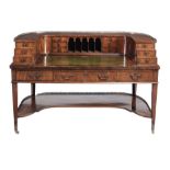 A mahogany and satinwood crossbanded Carlton House desk, in George III style   A mahogany and