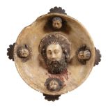 A sculpted alabaster bowl modelled with the head of Saint John the Baptist   A sculpted alabaster