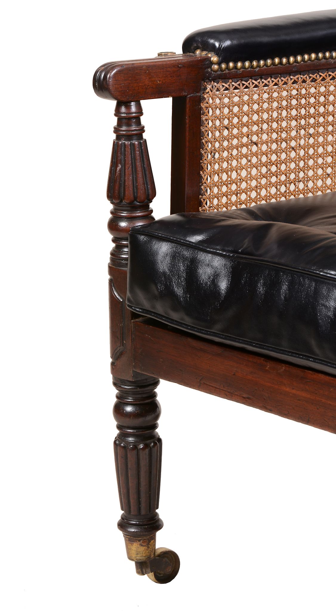 A George IV mahogany library bergere armchair , circa 1825   A George IV mahogany library bergere - Image 3 of 4