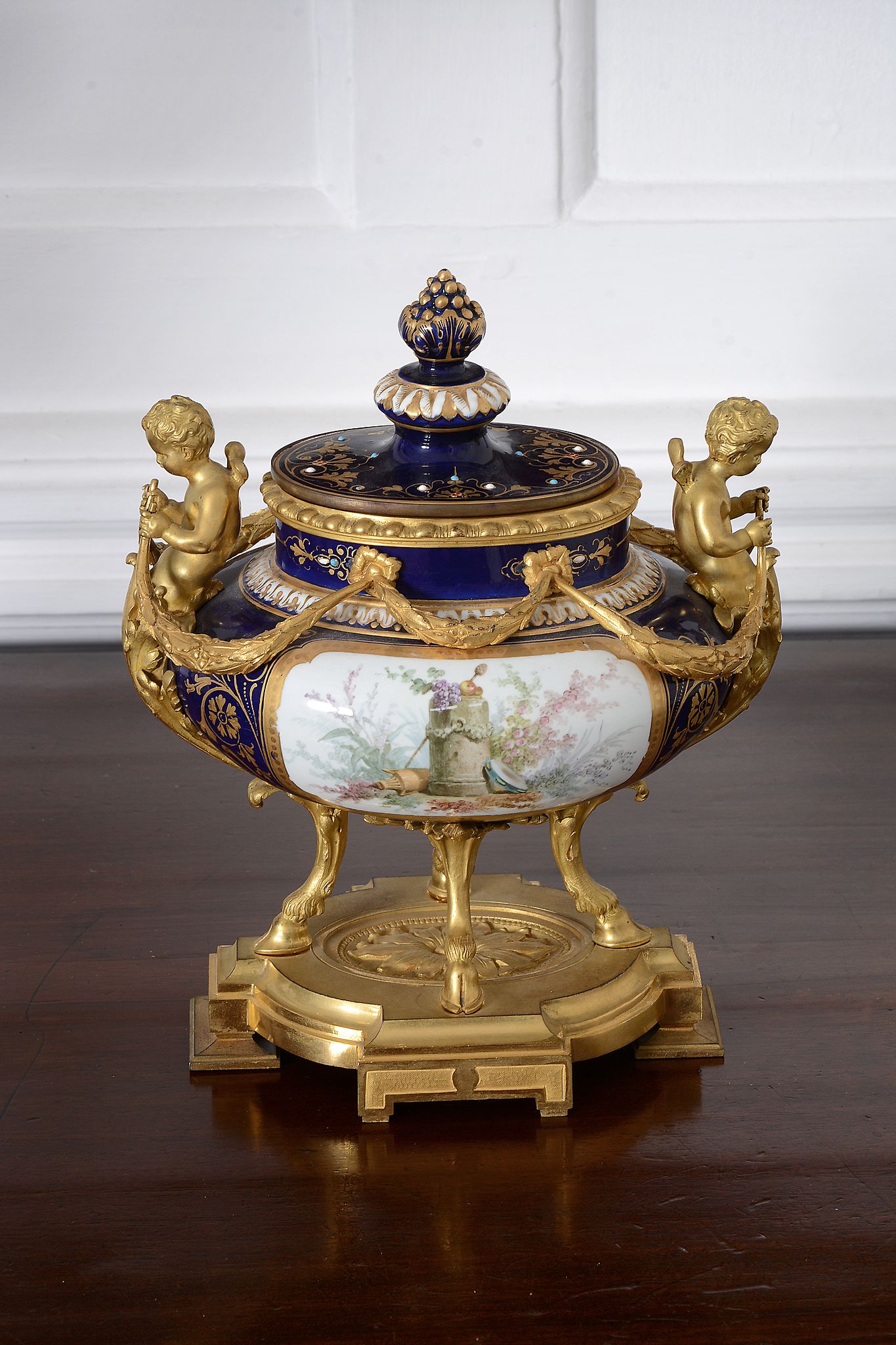 A Sèvres-style gilt-metal mounted urn and cover, late 19th century   A Sèvres-style gilt-metal - Image 2 of 5