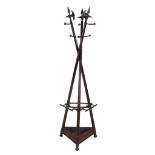 A Victorian beech, simulated bamboo, and metal mounted stick and hat stand   A Victorian beech,