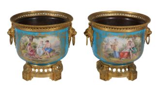 A pair of Sevres-style gilt-metal-mounted turquoise-ground jardinieres   A pair of Sevres-style