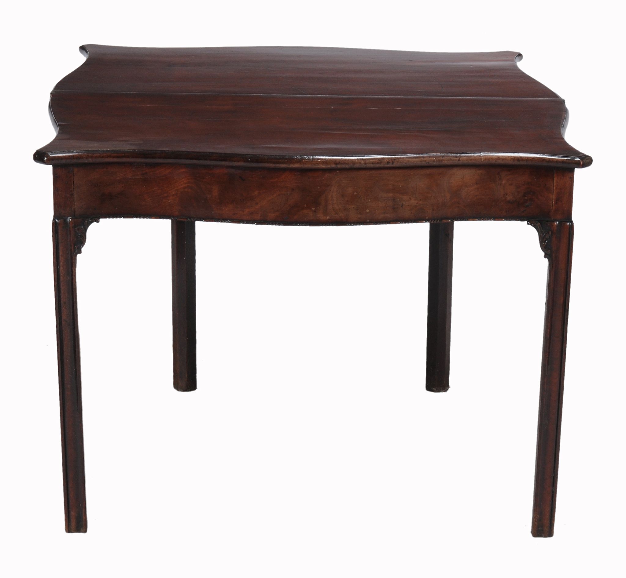 A George III mahogany serpentine folding tea table, circa 1770   A George III mahogany serpentine