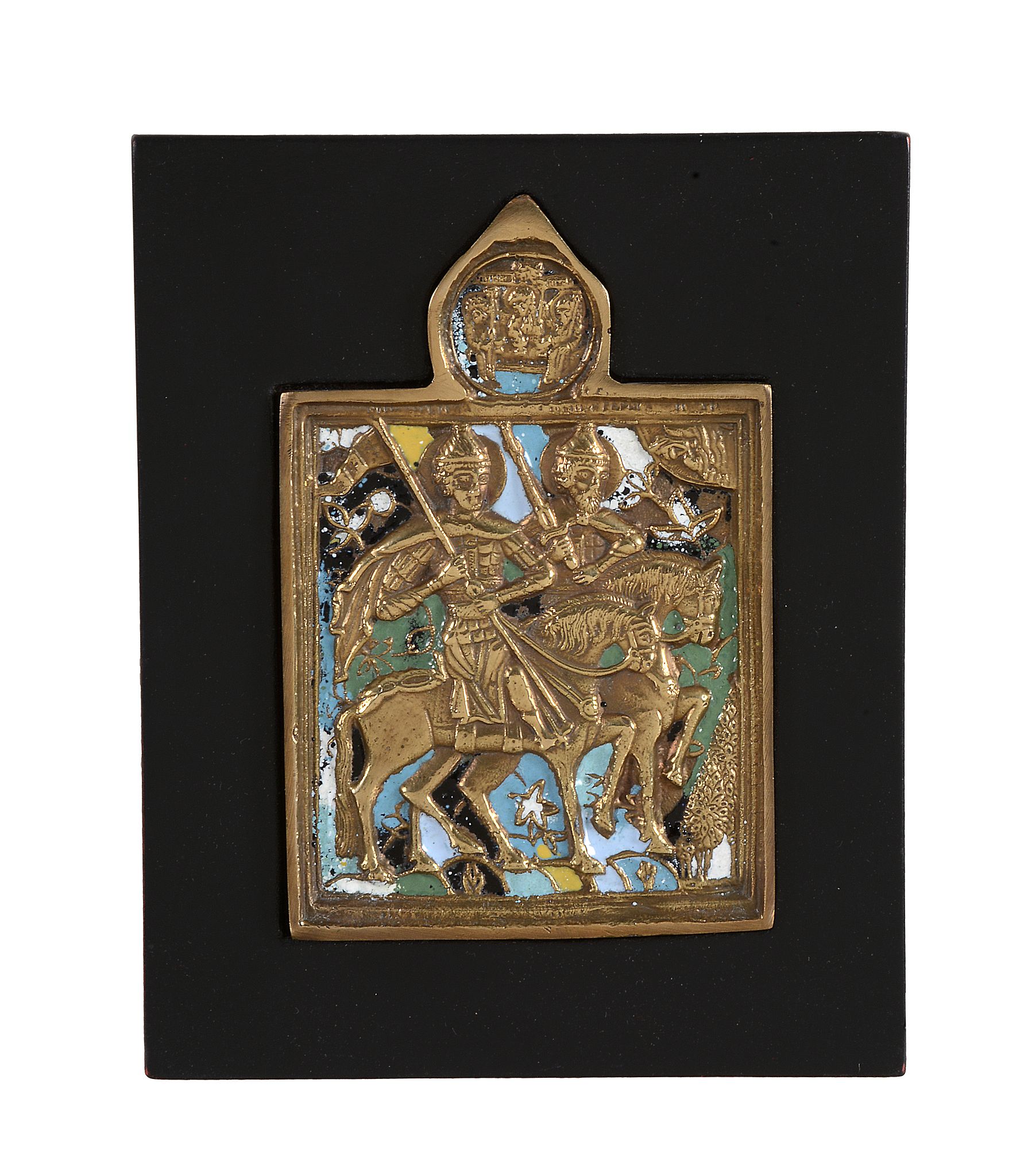 A Russian relief cast and enamelled brass icon A Russian relief cast and enamelled brass icon,