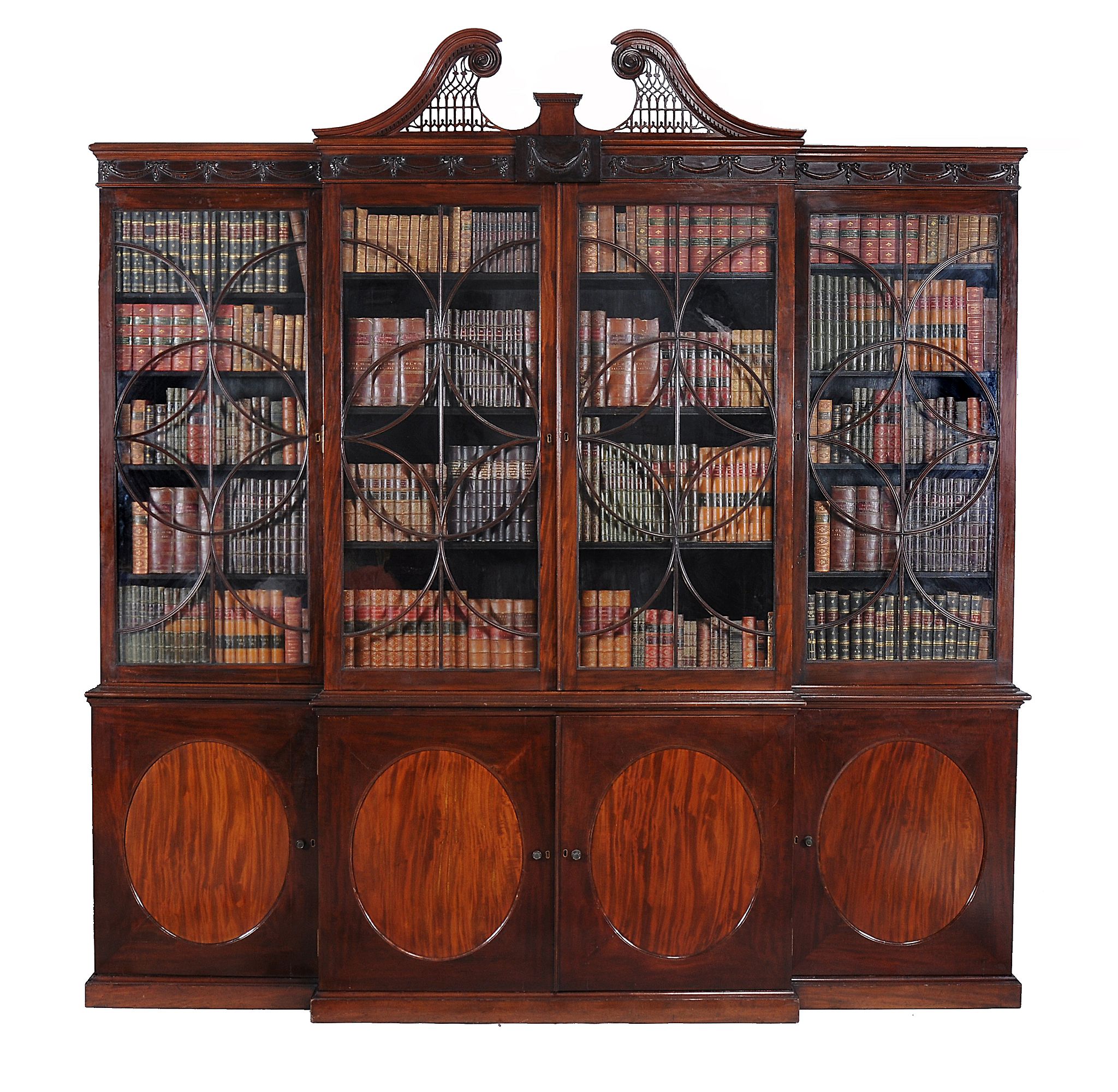 A George III mahogany breakfront library bookcase, circa 1780 A George III mahogany breakfront