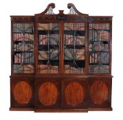 A George III mahogany breakfront library bookcase, circa 1780 A George III mahogany breakfront
