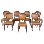 A set of seven Victorian mahogany library chairs , circa 1870   A set of seven Victorian mahogany