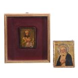 A Russian embossed, painted and parcel gilt metal icon, Saint Sarov A Russian embossed, painted