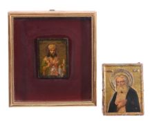 A Russian embossed, painted and parcel gilt metal icon, Saint Sarov A Russian embossed, painted