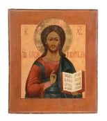 A central Russian polychrome painted and parcel gilt icon, Christ Pantocrator   A central Russian
