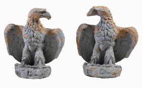 A pair of glazed stoneware pier finials modelled as spreadeagles A pair of glazed stoneware pier