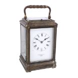 A French brass gorge cased carriage clock with push-button repeat Retailed...   A French brass
