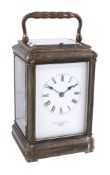 A French brass gorge cased carriage clock with push-button repeat Retailed...   A French brass