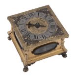 A fine Lithuanian engraved gilt brass horizontal striking table clock signed...   A fine