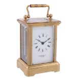 A French lacquered brass miniature carriage timepiece Retailed by Goldsmith...   A French