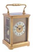 A French lacquered brass carriage clock Unsigned   A French lacquered brass carriage clock