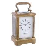 A French lacquered brass miniature carriage timepiece Retailed by J   A French lacquered brass