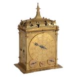 A fine German gilt brass quarter striking table clock with annual calendar...   A fine German gilt