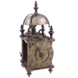 A brass miniature lantern timepiece with alarm Unsigned   A brass miniature lantern timepiece with