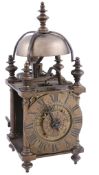 A brass miniature lantern timepiece with alarm Unsigned   A brass miniature lantern timepiece with