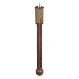 A George III mahogany stick barometer Dollond, London   A George III mahogany stick barometer