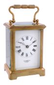 A French lacquered brass carriage timepiece with two-plane lever escapement...   A French