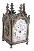 A decorative brass Gothic revival miniature mantel timepiece The dial...   A decorative brass Gothic