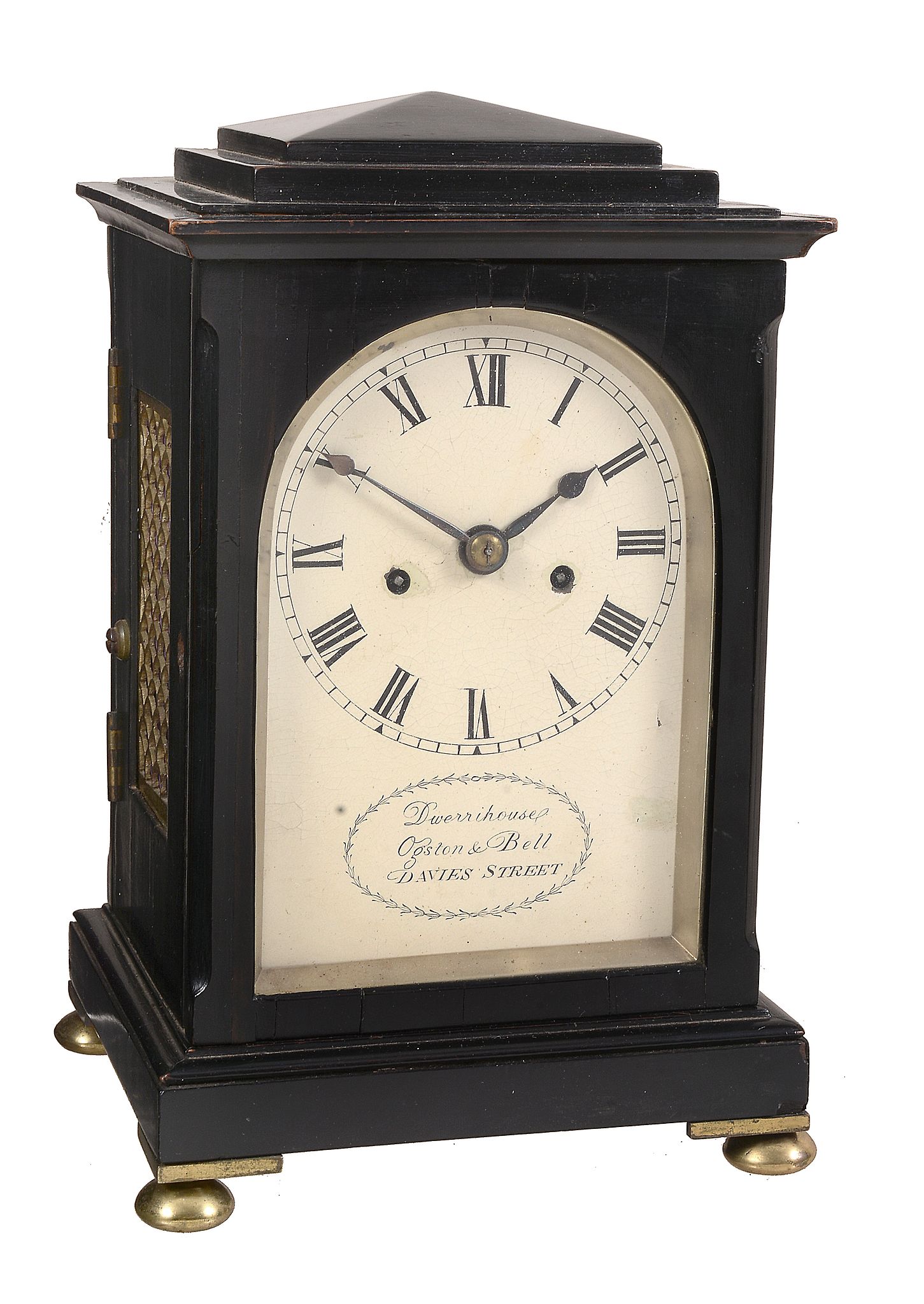 A William IV small ebonised table clock Dwerrihouse, Ogston and Bell, London   A William IV small